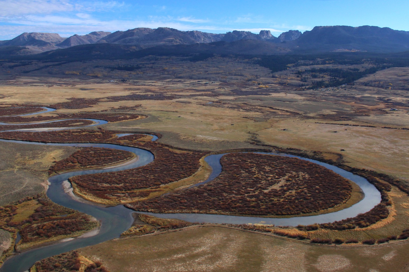 River bends winding through the landscape from above