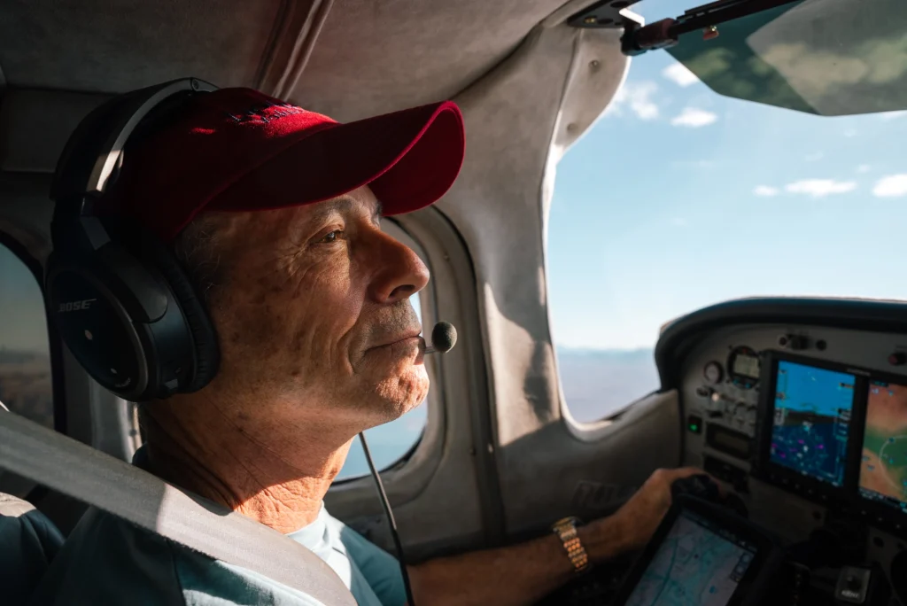 LightHawk volunteer pilot John Anson at the controls.