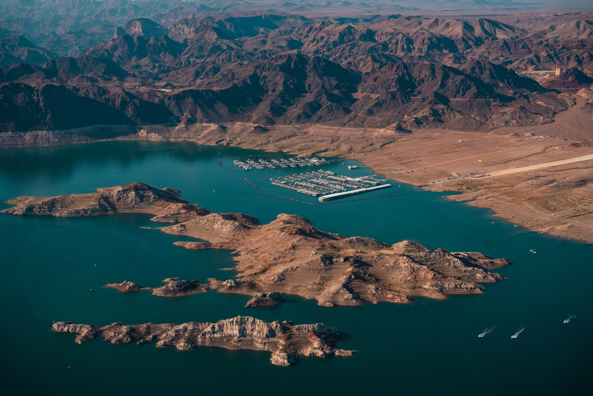 A Lake Powell marina sits next to a boat ram that no longer reaches the water.