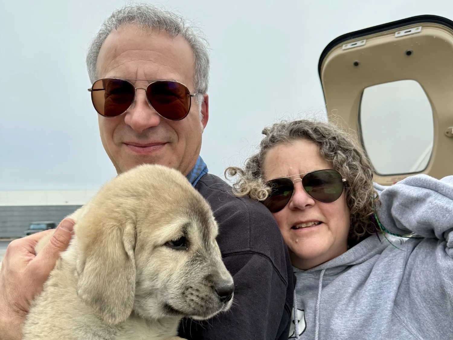 LightHawk volunteer pilots Ken and Gabrielle Adelman with an Anatolian Shepherd.